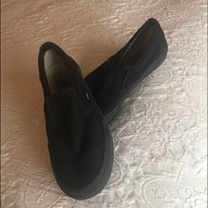 Vans black slip ons